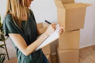 woman with cardboard boxes