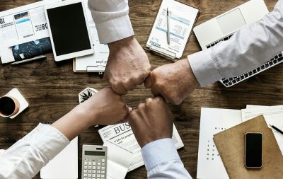 fists over desk